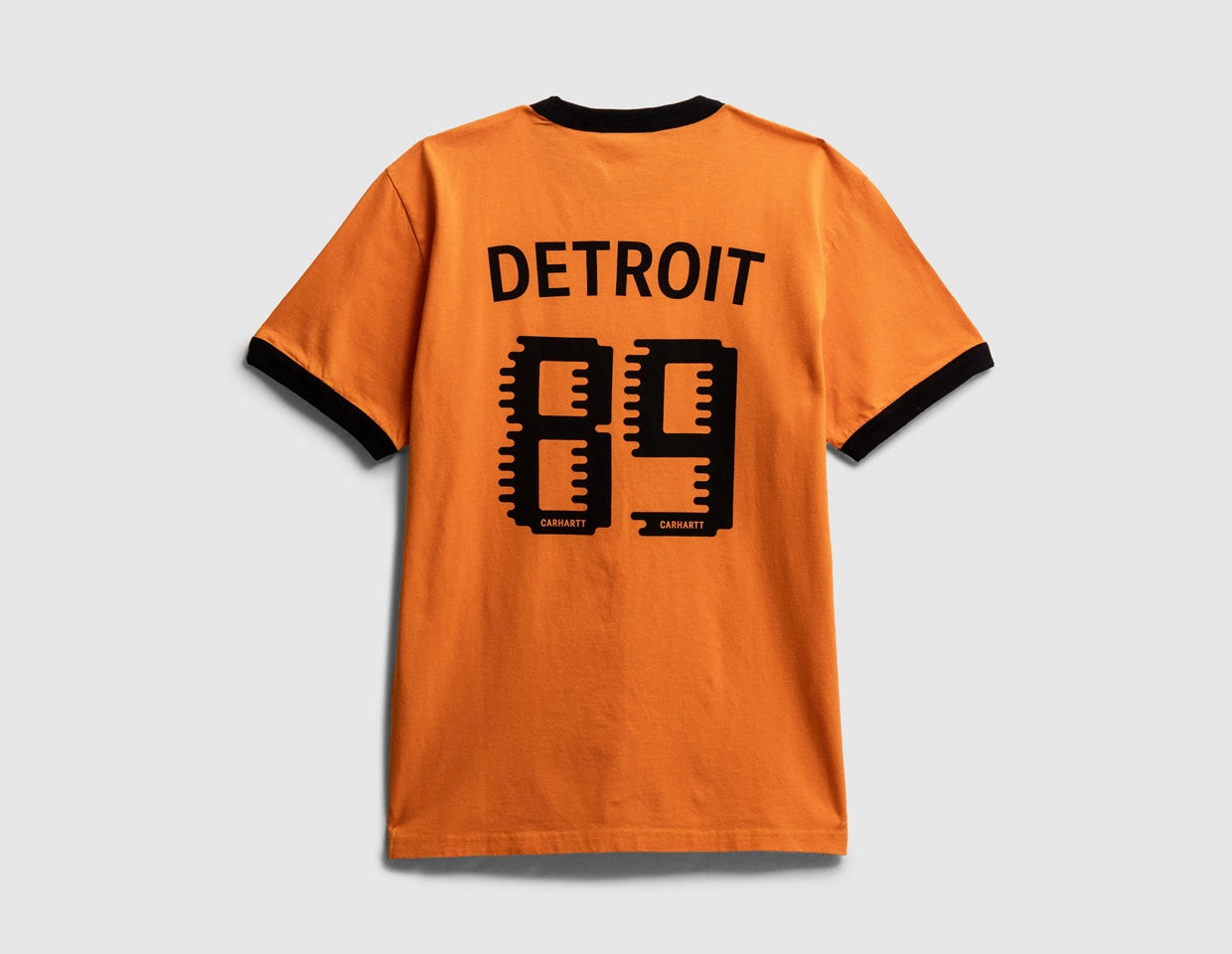 Casual Outfit Minimalist Design Carhartt WIP 89 Ringer Tee Pumpkin / Black