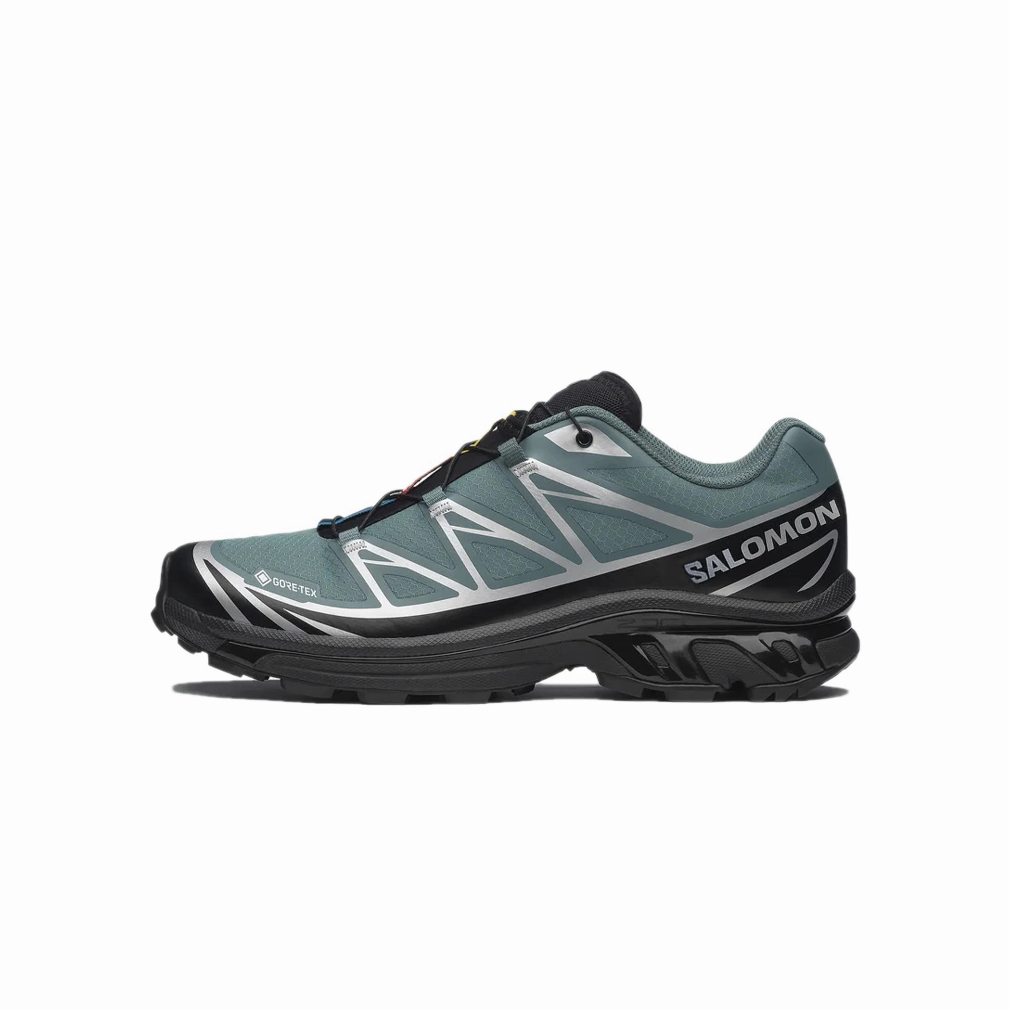 Salomon Mens XT-6 Gore-Tex Shoes veteran running footwear running in a bus station area shoes