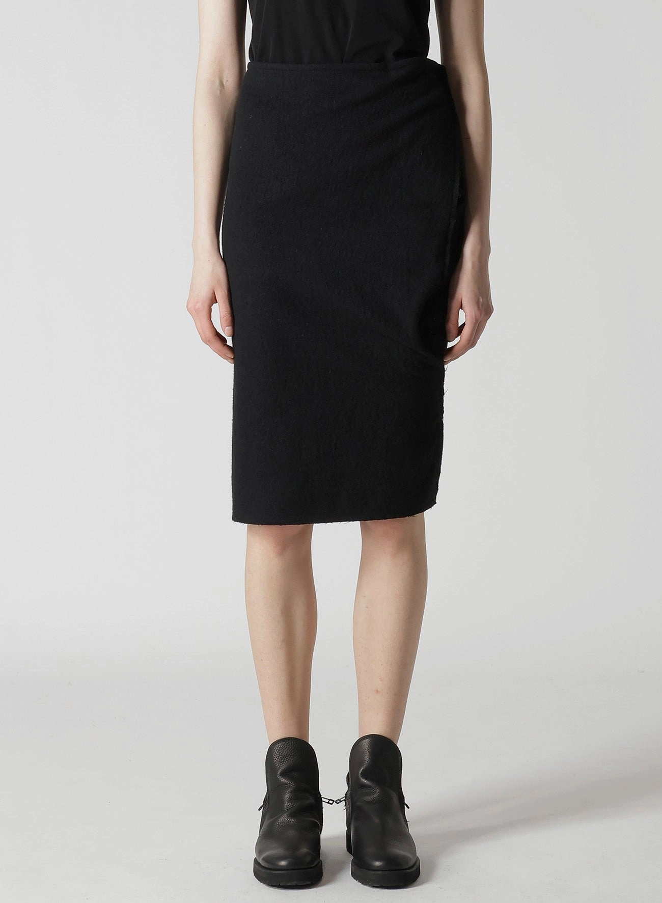 SHRINKED WOOL SERGE TWISTED SKIRT Glossy Detail Poised Vibe