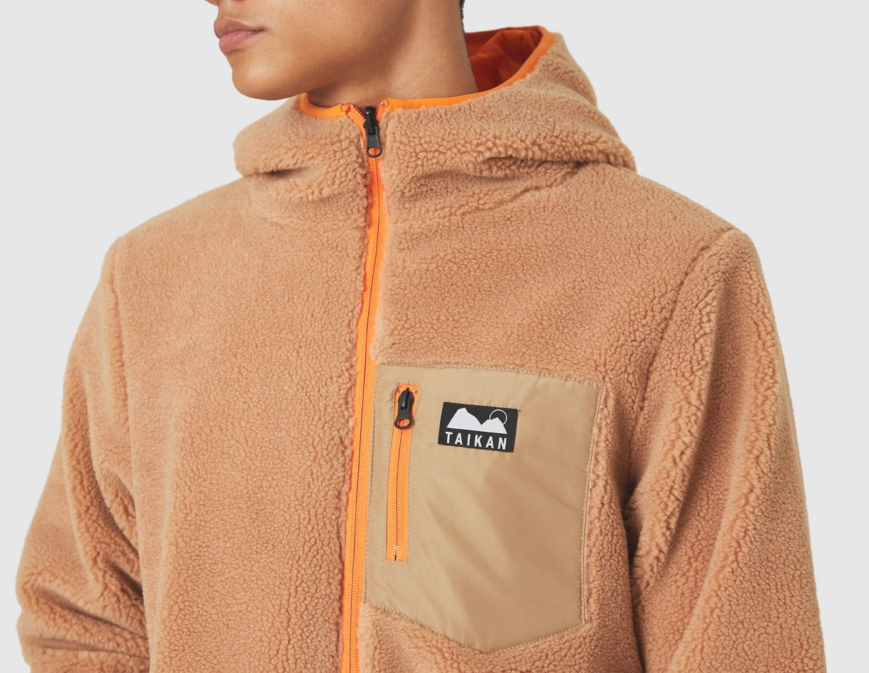 Adjustable Hem Lock System Anti Snag Fabric Taikan Reversible Puff Jacket / Tan / Orange